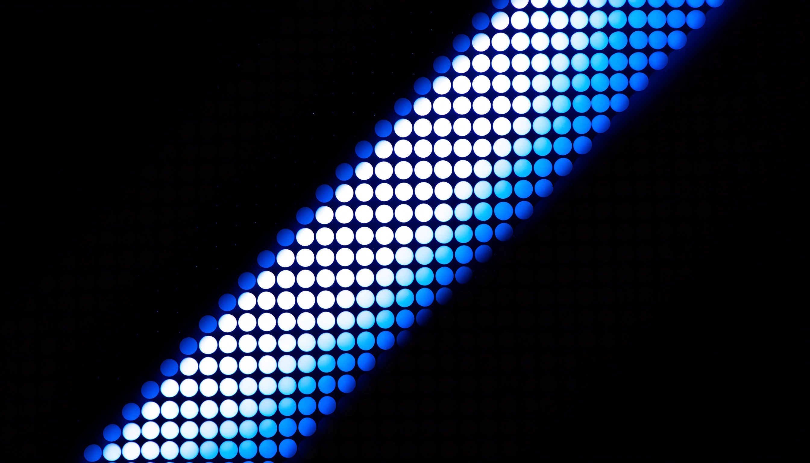 Data grid with selective blue illumination representing how research design constrains what can be found